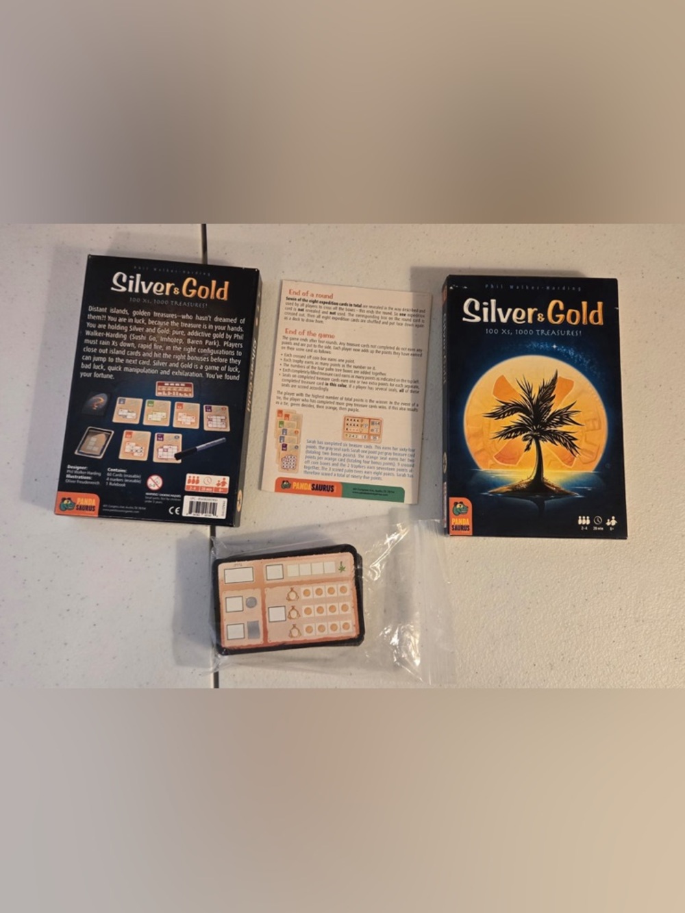 Silver and gold roll and write card game